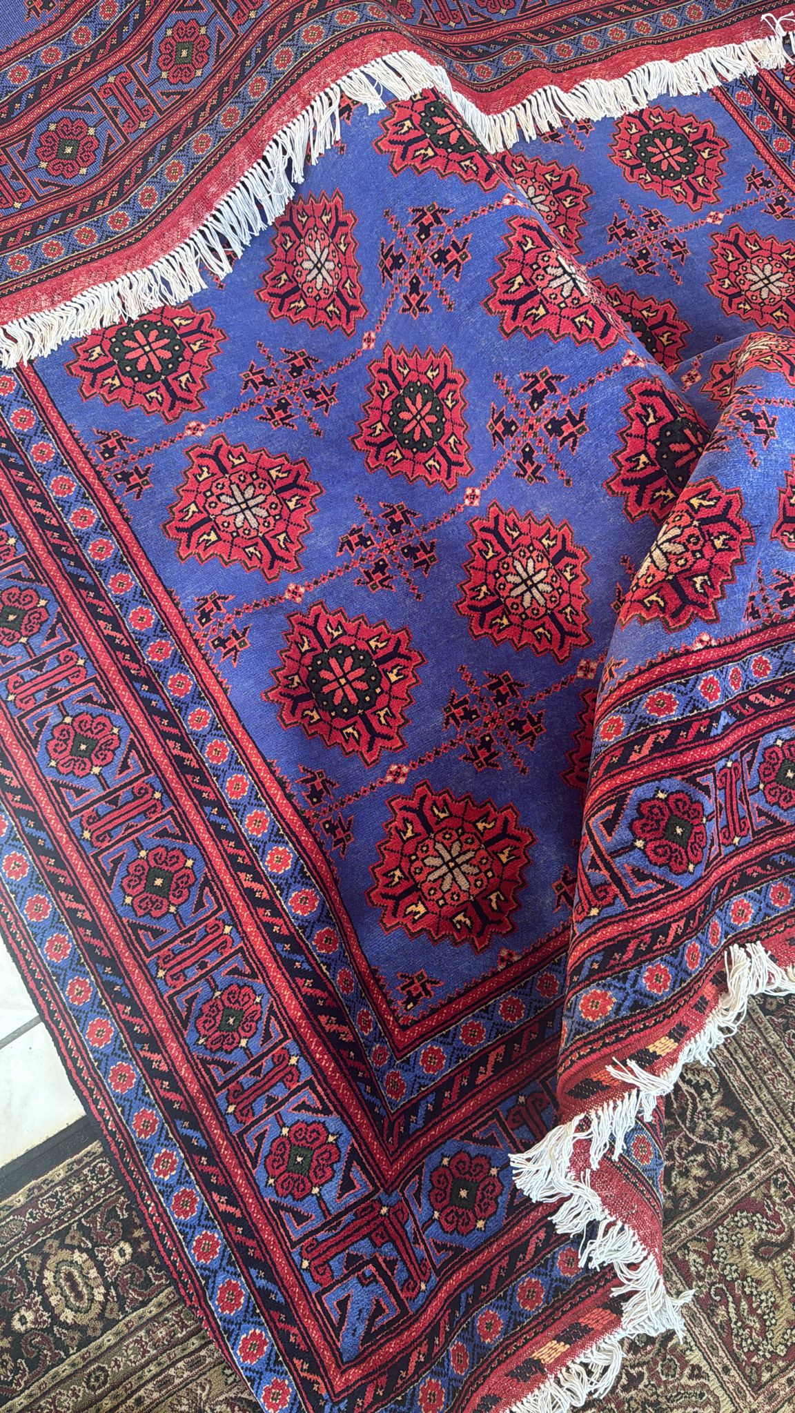 Hand-knotted Afghani rug 6’6” x 9’6”