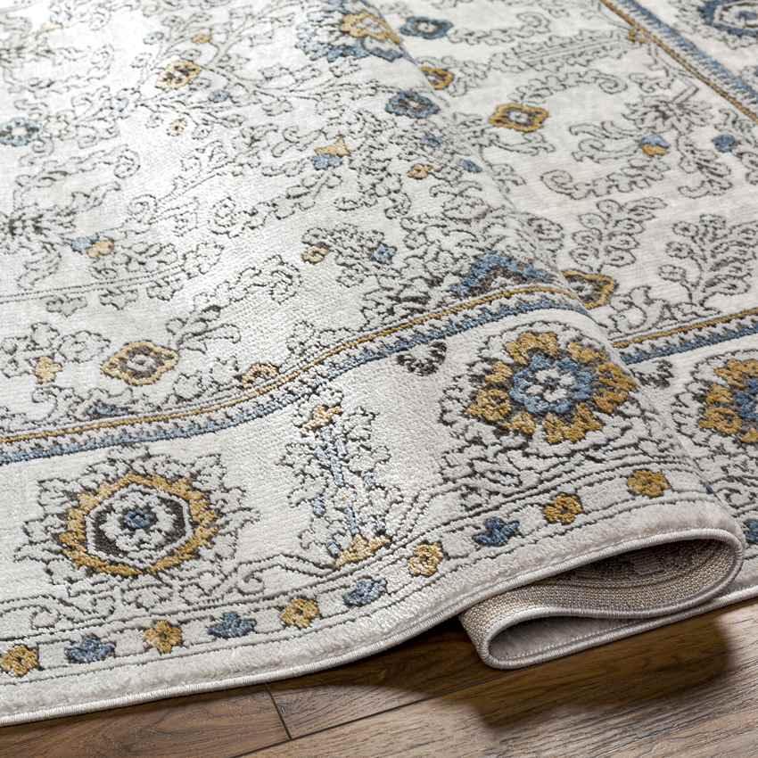 Andru Traditional Ivory Area Rug