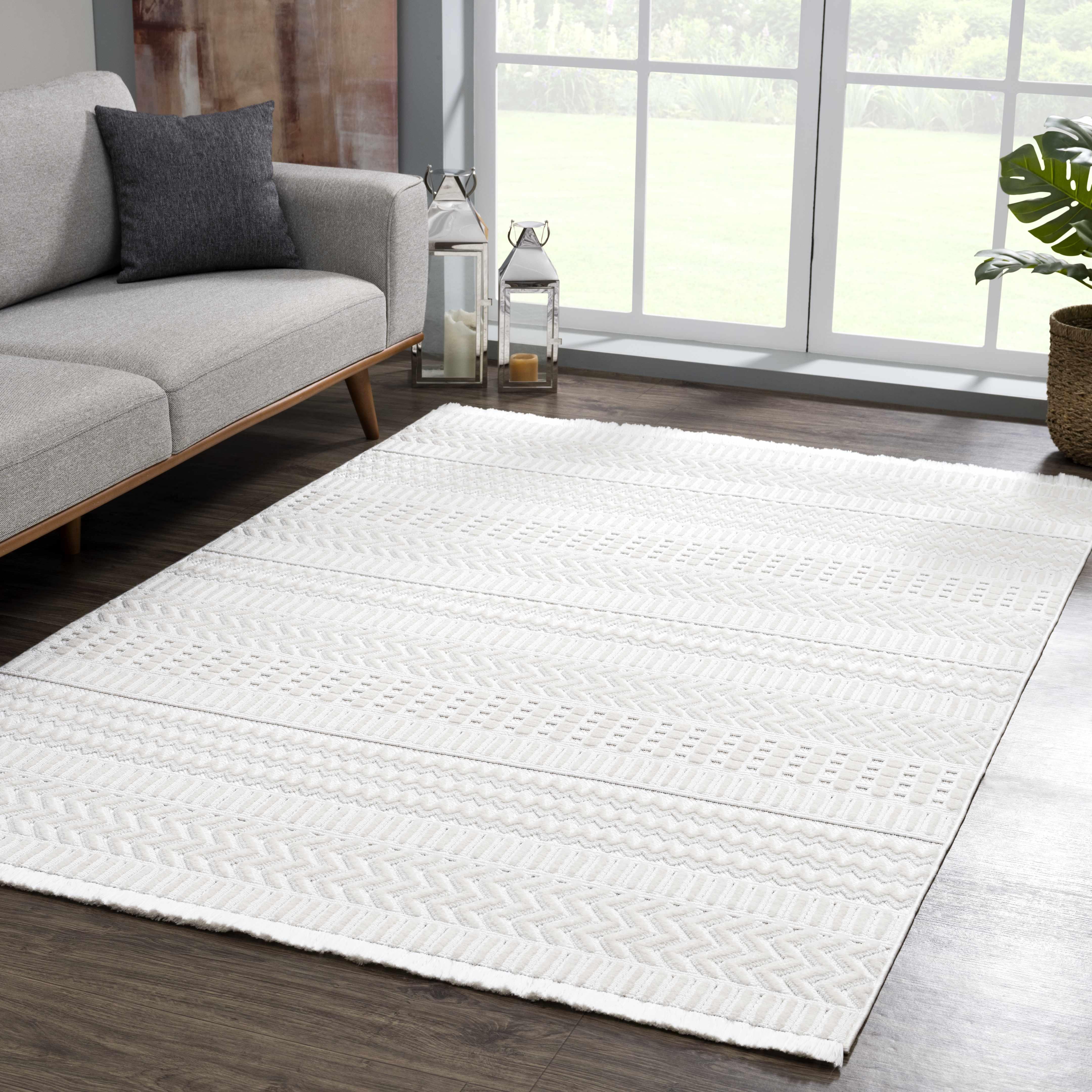 Cira Ivory Textured Area Rug with Fringes