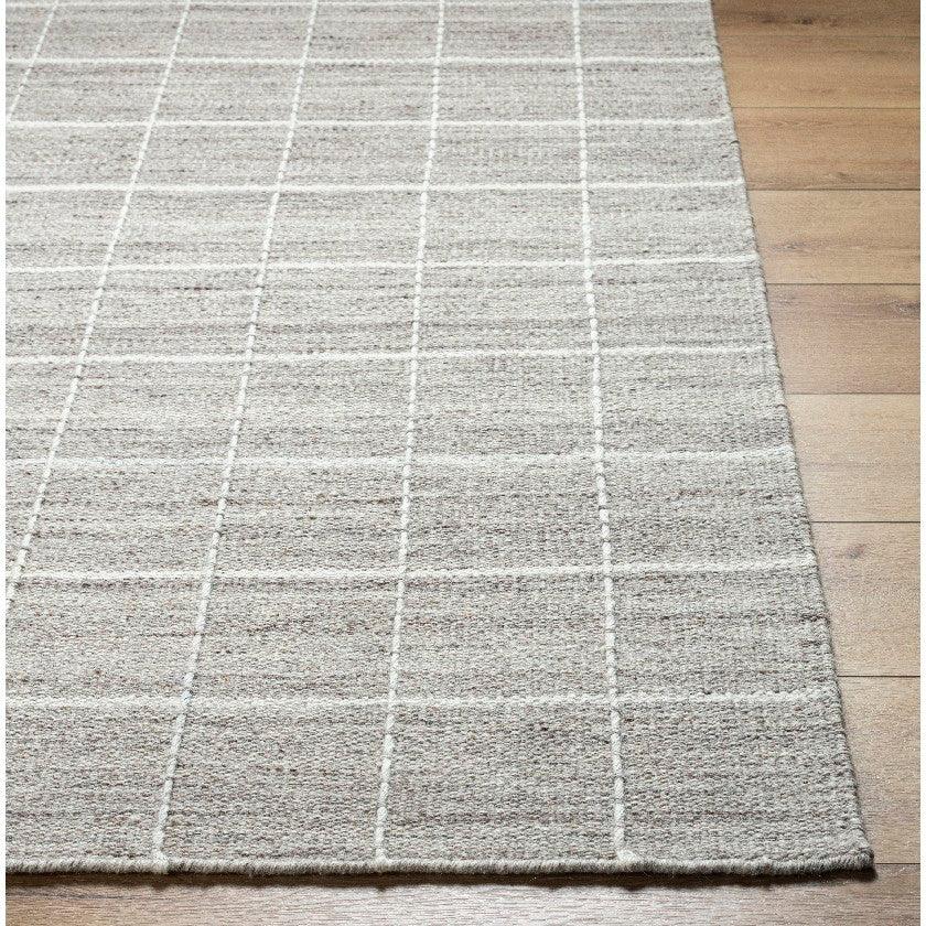 Ishaq Solid and Border Ivory/Tan Area Rug