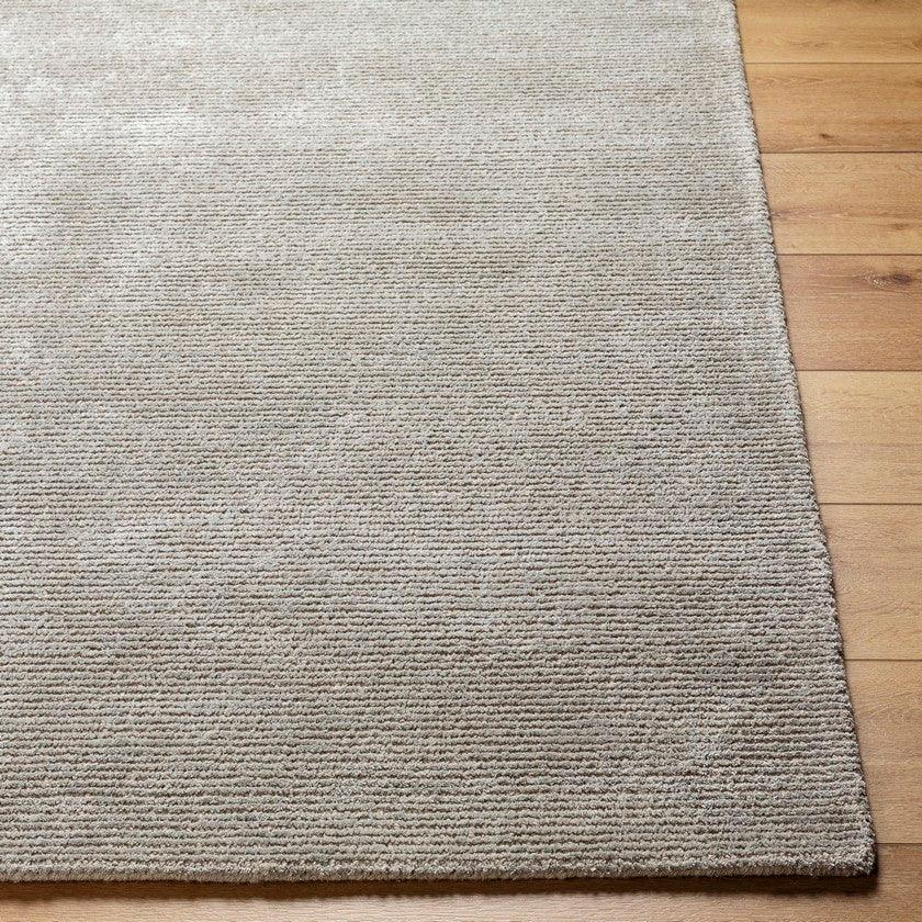 Jett Solid and Border Medium Gray Area Rug