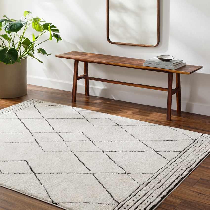 Josue Modern Ivory/Black Area Rug