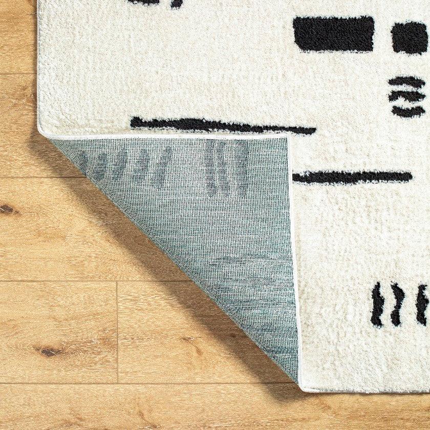 Keyauna Modern Ivory/Black Area Rug