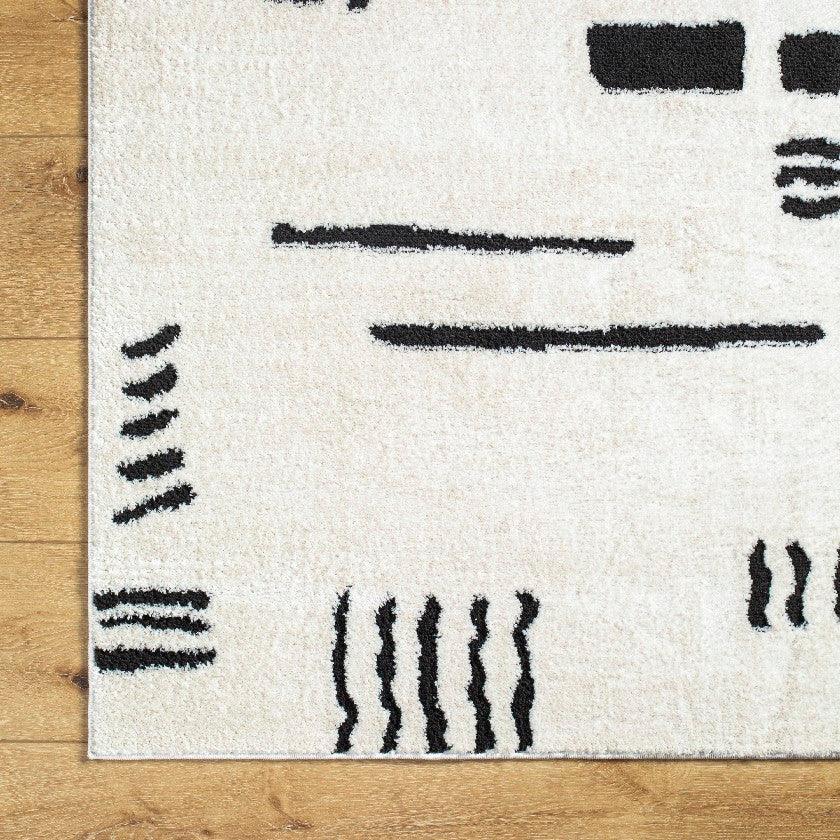 Keyauna Modern Ivory/Black Area Rug