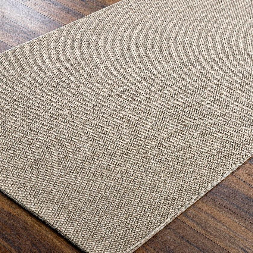 Nalani Solid and Border Dark Brown Area Rug